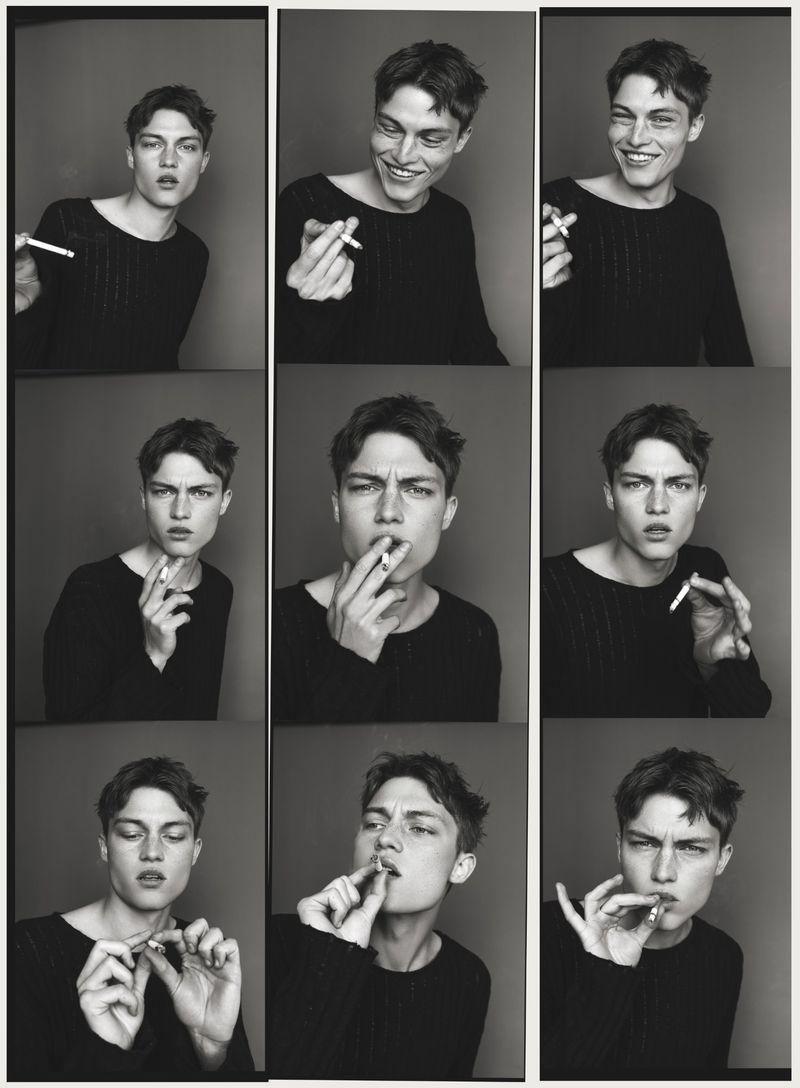 Black and white contact sheet grid of nine portraits featuring a young man smoking a cigarette against a neutral studio backdrop.