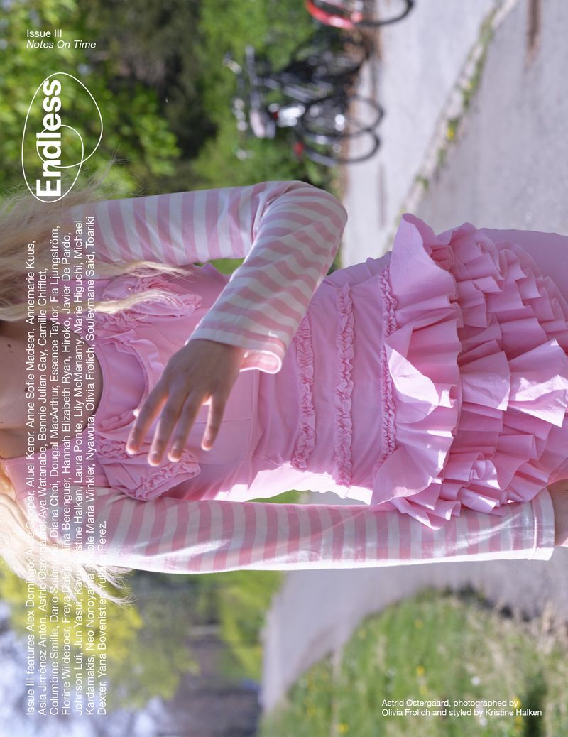 Magazine cover featuring a young girl in pink with bicycles blurred in the background, text including the magazine title 'Endless'.