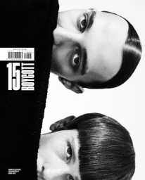 Close-up portrait of two male models with dark hair against a plain white background for Boycott Magazine issue 15