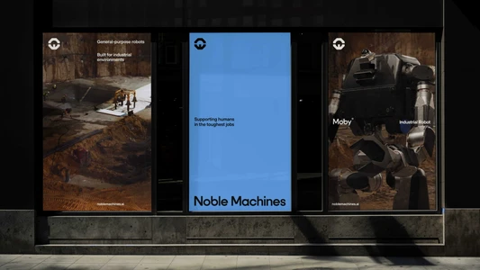 Three window display posters for Noble Machines robotics brand identity installed across a dark storefront glass facade.