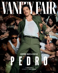 Pedro Pascal held aloft by a crowd of reaching hands wearing an olive green suit and white tank top for Vanity Fair