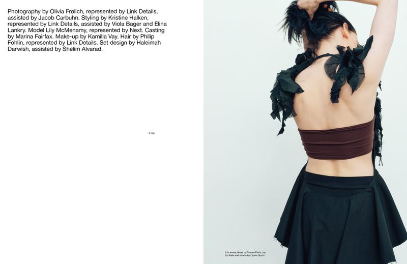 Model showcases a Trassol Paris dress with a brown top and black skirt against a white background, photographed from the back.