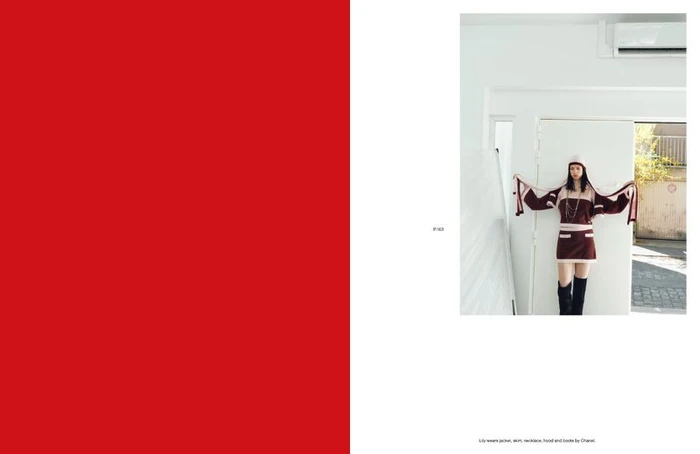 Fashion magazine spread featuring Lily McMenamy in a brown knit skirt suit and boots against a solid red and white graphic layout.