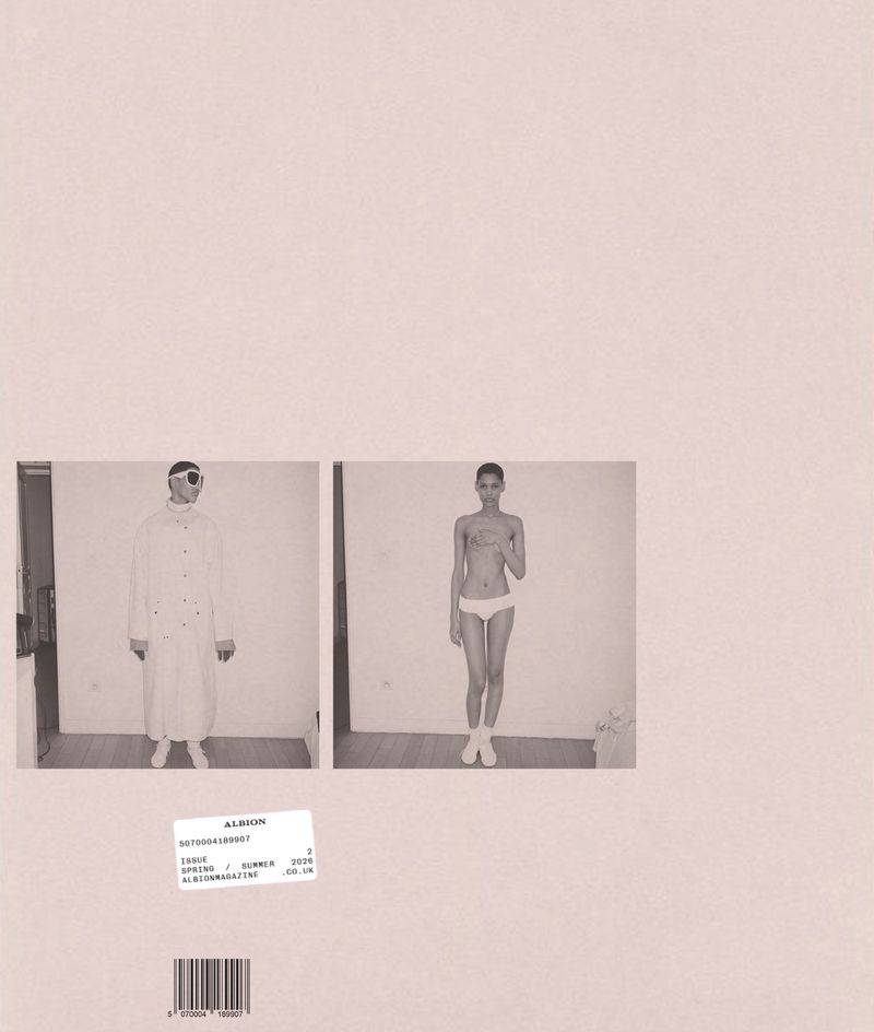 Magazine cover layout with two small model portraits set against a large pale beige background with barcode and label.