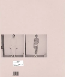 Magazine cover layout with two small model portraits set against a large pale beige background with barcode and label.