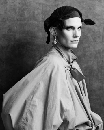 Model Lena Hardt wearing a dark headscarf and voluminous top for Telva magazine project Lena photographed by Javier Biosca.