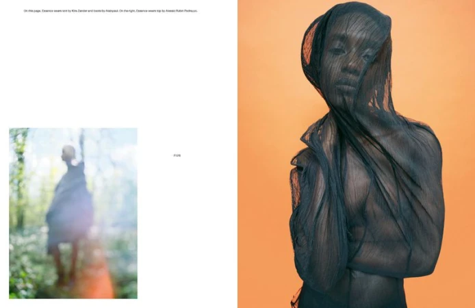 Portrait of a person wearing a sheer black garment, set against a bright orange background, artistic fashion editorial shot. 