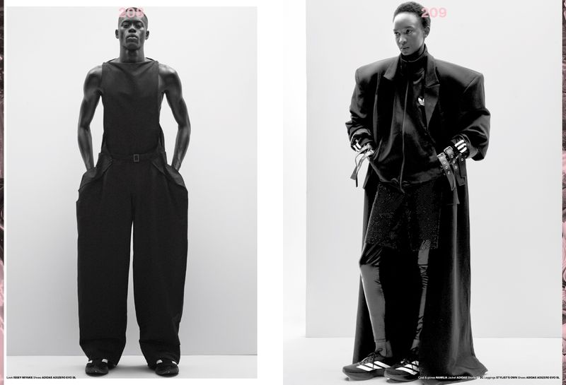 Two fashion models pose in black outfits against a white backdrop, showcasing minimalist and edgy designs for a high-fashion aesthetic.