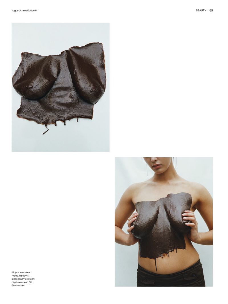 Magazine editorial page showing a molded chocolate torso cast and a model holding it over her chest against a white background.