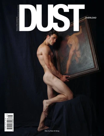 Nude male model posing while holding a large framed classical oil painting against a dark backdrop for Dust Magazine.