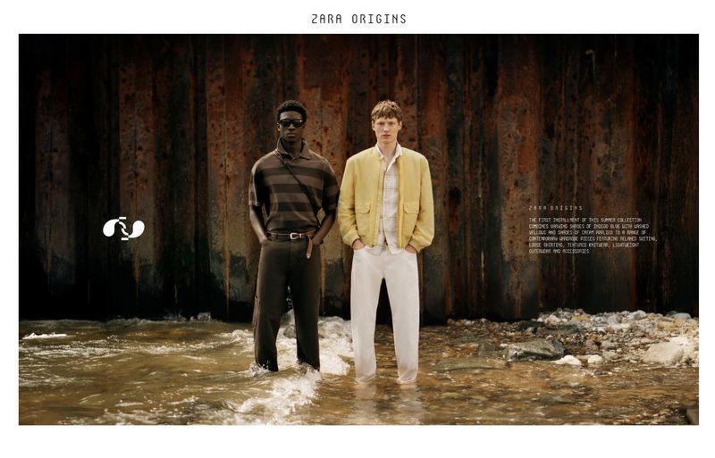 Two male models standing in shallow water before a weathered wall for the Zara Origins campaign.