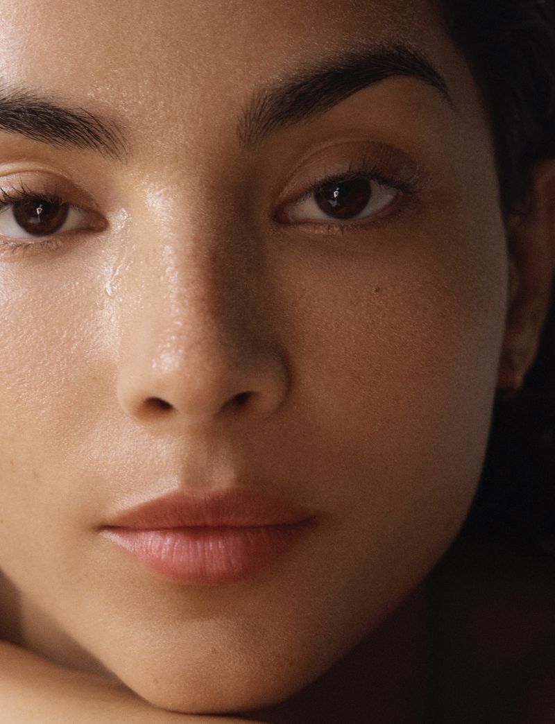 Close-up portrait of model Tindi Mar featuring natural skin texture for Vogue Turkey photographed by Amie Milne