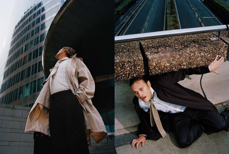Diptych of male model Stanislav Pliasulia wearing an oversized beige trench coat and black tailoring in urban architecture settings.