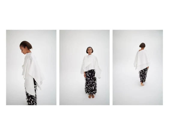 Triptych of model Romae Gordon posing in a white draped cape and textured fringed black skirt against a white studio background.