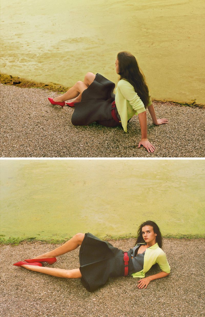 Diptych of a model in a lime green cardigan, charcoal skirt, and red flats reclining on gravel beside green pond water.