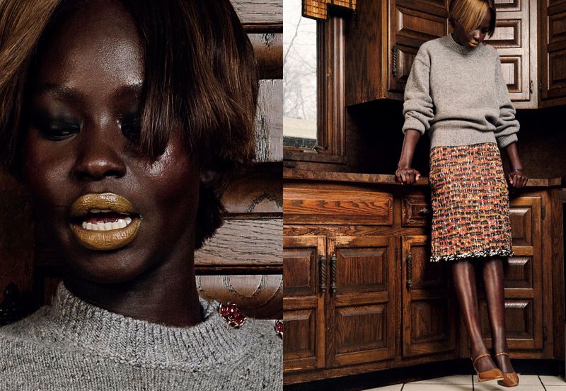 Diptych of model Aweng Chuol in a grey sweater and tweed skirt against rustic wooden kitchen cabinetry.