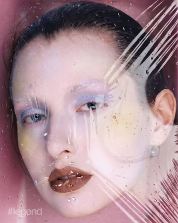 Close-up beauty portrait of a woman viewed through water droplets and stretched plastic film with pastel makeup and brown lipstick.