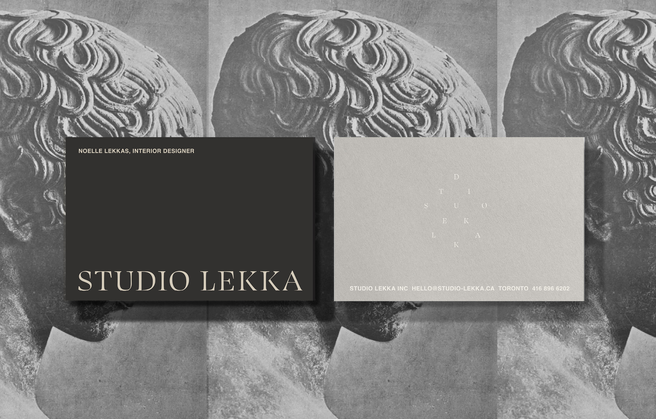 Two Studio Lekka business cards in black and light grey shown over a monochrome repeating classical sculpture background.