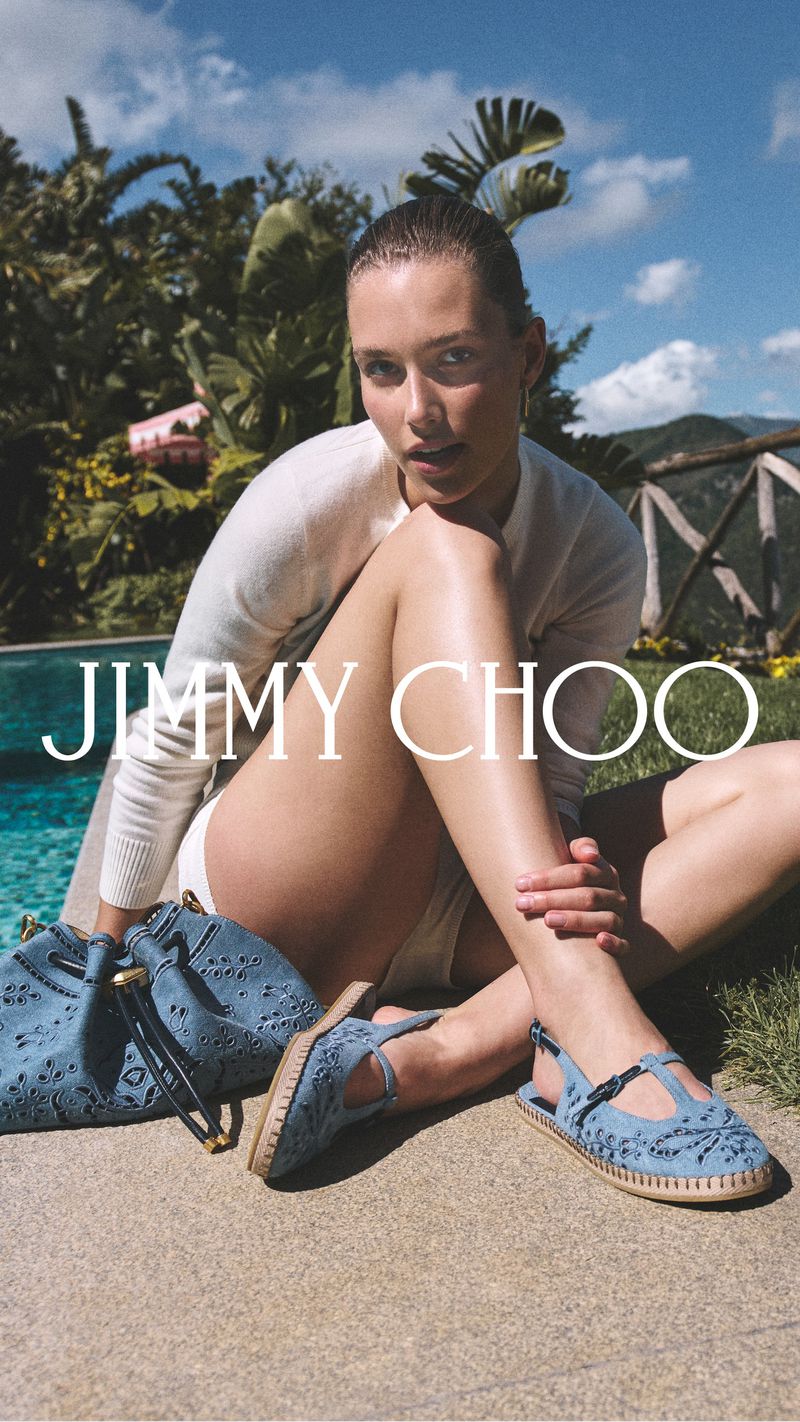 A fashion shot features a model sitting next to a pool wearing a white top and matching bottoms, next to a blue bag and sandals.