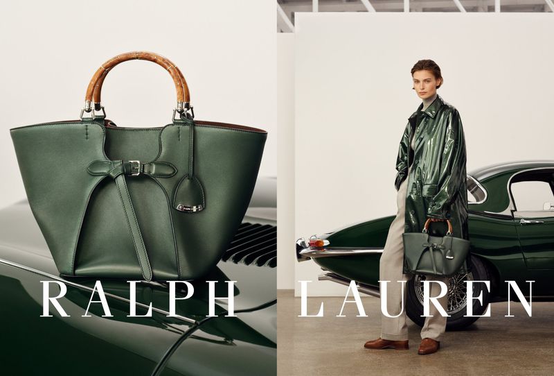 Ralph Lauren ad featuring a green leather handbag with bamboo handle displayed on a car hood next to a model with a matching bag.