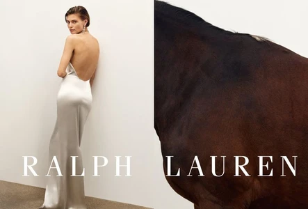Model in a backless white silk gown standing against a plain wall next to a dark horse for Ralph Lauren Pre-Fall 2025