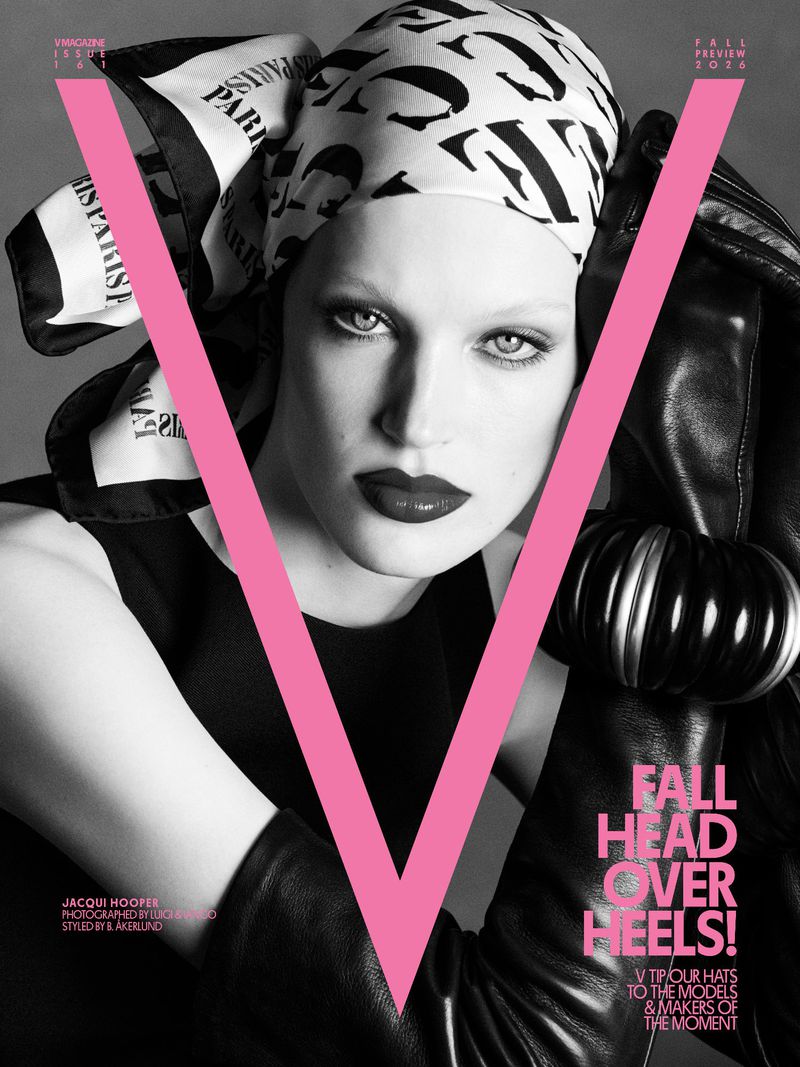 Model Jacqui Hooper wears a printed headscarf and black leather gloves framed by a bold pink V logo on the cover of V Magazine.