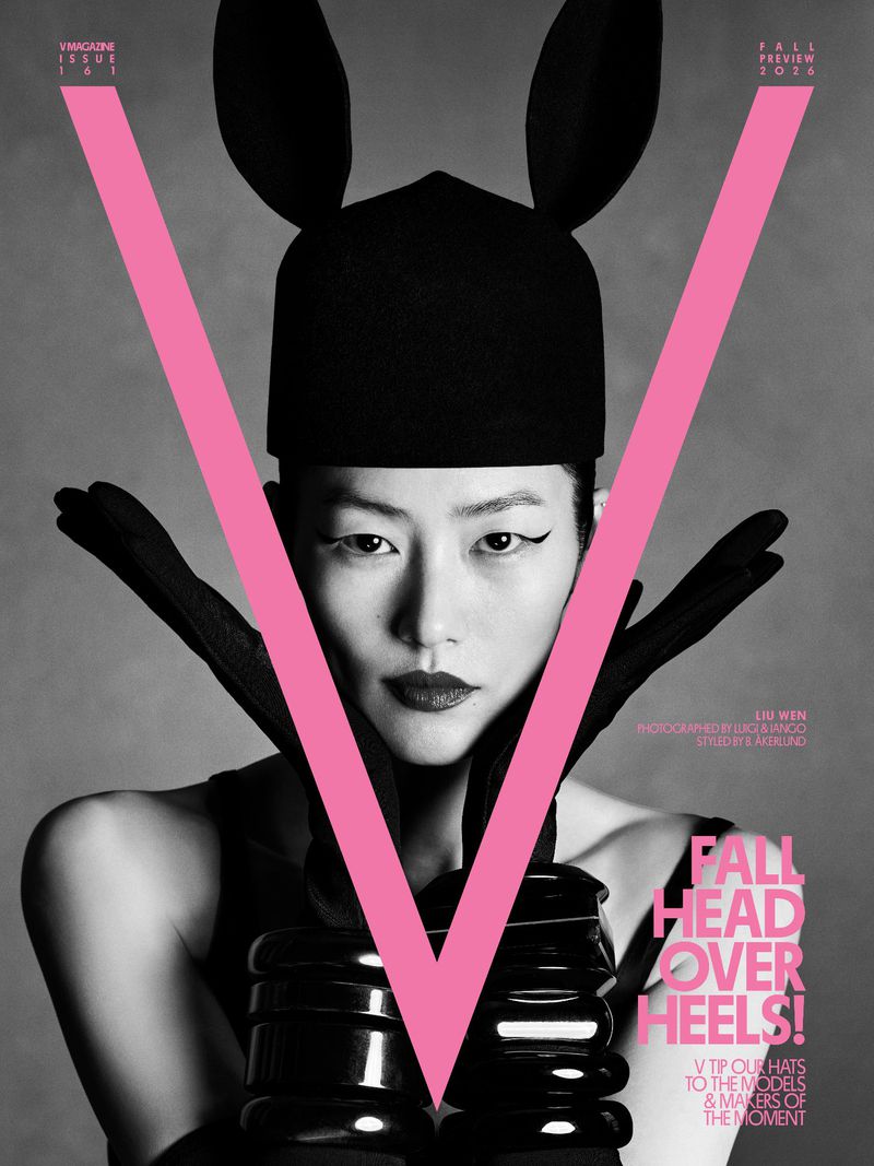 Model wearing a black hat with rabbit ears and black gloves for V Magazine fall preview cover