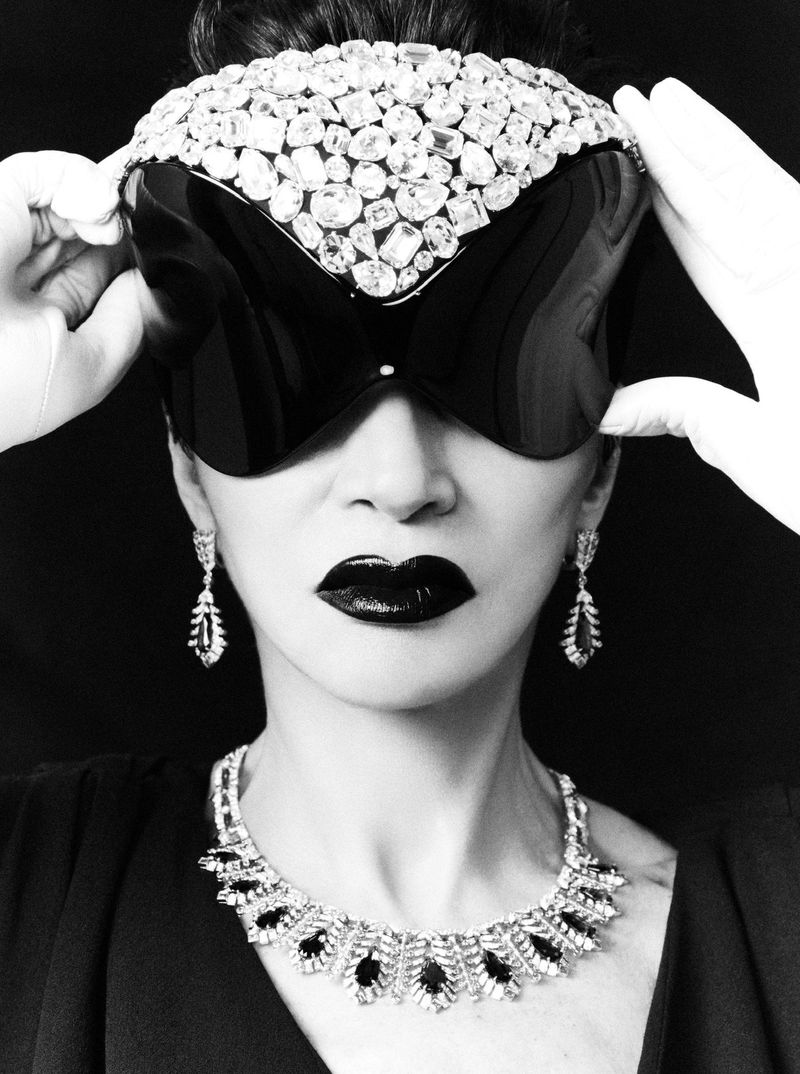 Model Farida Khelfa wearing an elaborate crystal headpiece and dark sunglasses for Vanity Fair Espana project Farida.