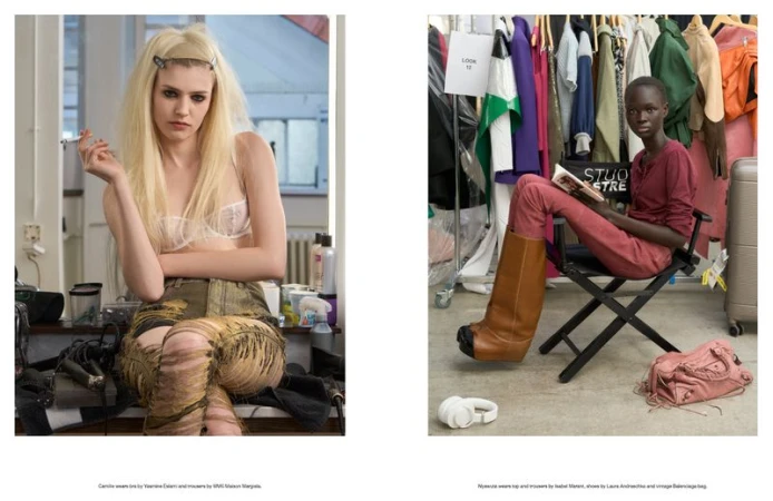 Two fashion models backstage at a fashion show, one blonde smoking a cigarette and one Black woman reading a book in brown boots.