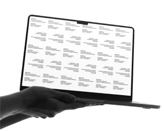 Silhouetted hands holding a laptop displaying a grid of repeating MAPP_MTL festival typography against a stark white background.