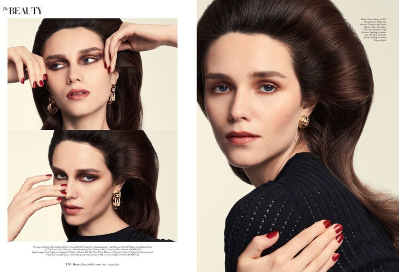 Magazine editorial beauty spread featuring a woman with sculptural voluminous brown hair, smoky eye makeup, gold earrings, and red nails.