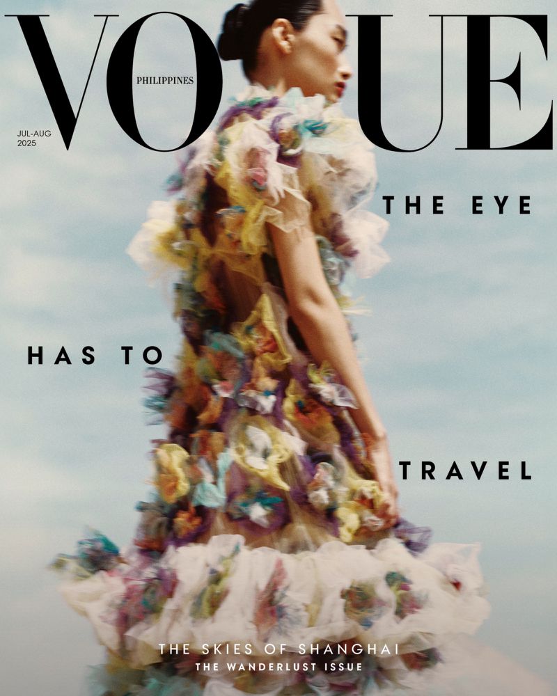 Vogue Philippines magazine cover, July/August 2025 issue. A woman wears a voluminous, floral dress against a pale sky.