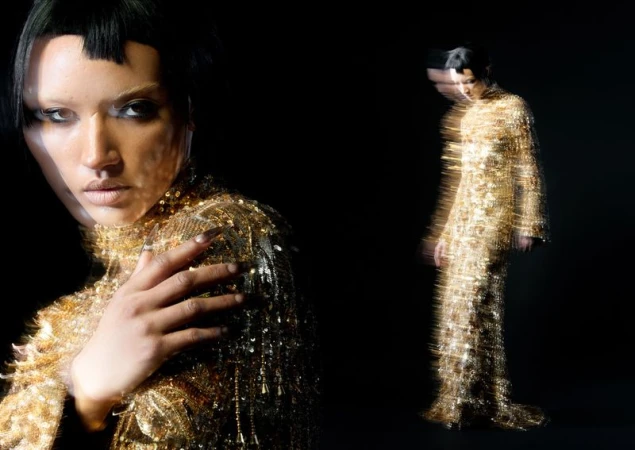 Model Georgia Palmer wearing a sparkling gold sequined gown against a black backdrop with a motion-blurred composite silhouette.