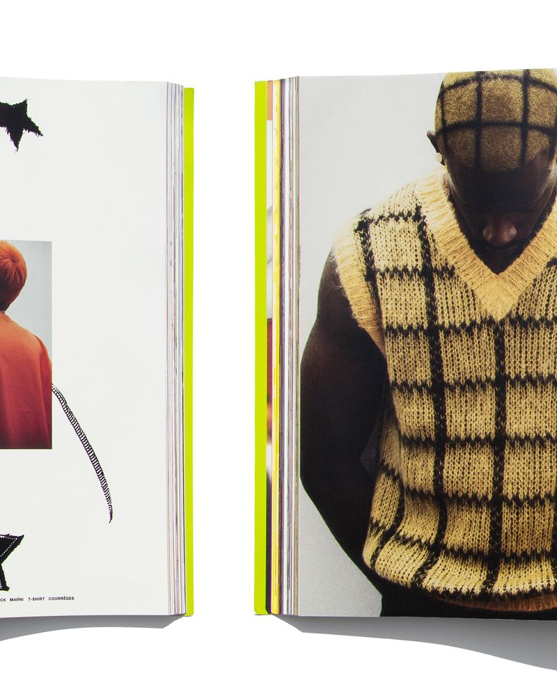 Fashion editorial spread showing a man looking down wearing a yellow and black grid knit sweater vest with matching patterned hair.