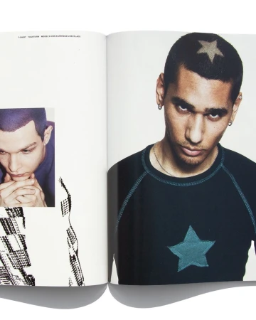 Open magazine spread featuring a man with a star motif shaved into his buzzcut wearing a dark t-shirt with a matching teal star.