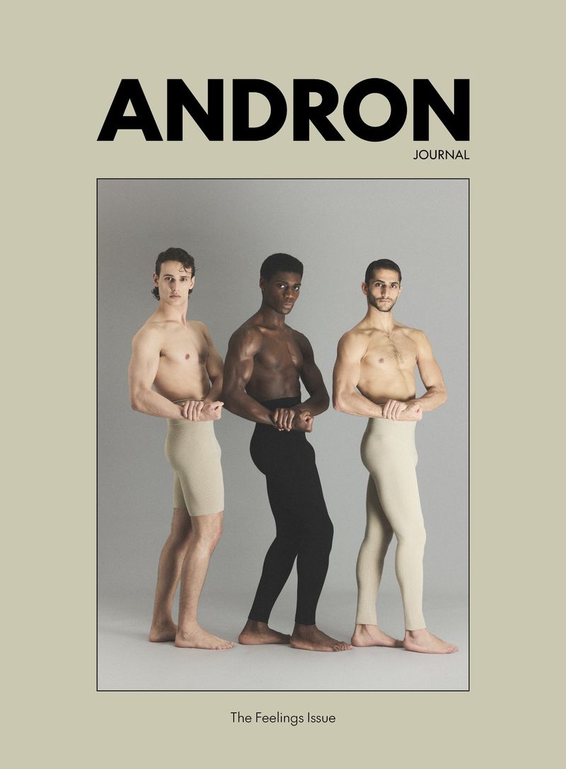 Three male models posing shirtless against a grey studio backdrop for Andron Journal