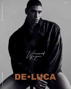 Man wearing a black leather jacket against a grey studio backdrop for DELUCA Magazine editorial