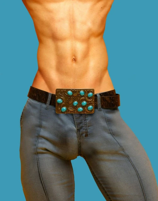 Torso of an adult male wearing jeans and a decorated belt against a turquoise background, focusing on the abdomen and hips.
