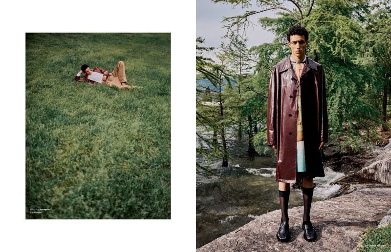 A male fashion model poses in a brown vinyl trench coat near a forest stream, and lies in grass in a split-screen fashion layout.