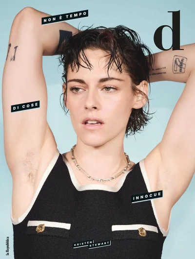 Kristen Stewart posing with arms raised wearing a black top with white trim for D la Repubblica magazine cover.