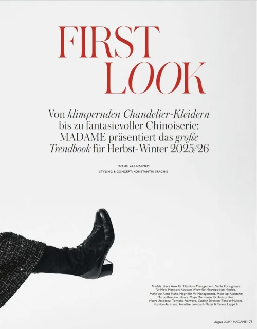 Fashion editorial shot featuring a woman's leg and foot wearing a black boot against a stark white background with red magazine text.