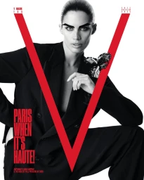 Model Sara Sampaio wearing a black blazer and bold geometric eyebrows against a solid white background for V Magazine.