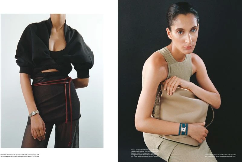 Two women in studio wearing fashionable clothing, one in black with a sheer skirt and the other in beige with a large purse.