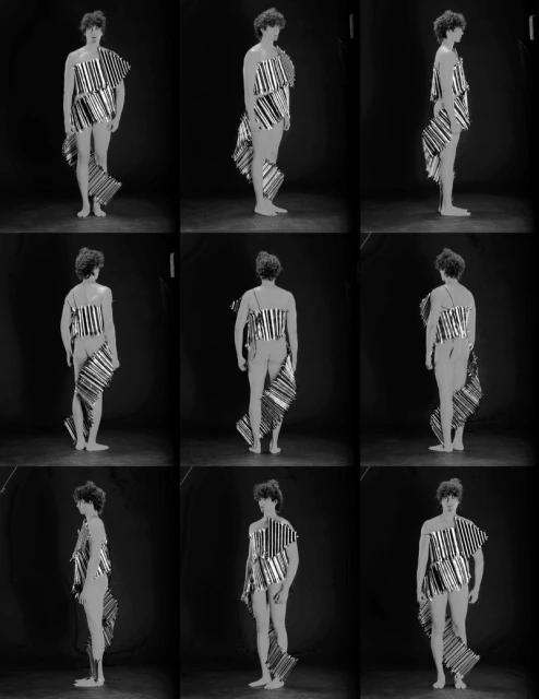 Collage of nine black and white full body shots of a person wearing striped paper garment in a dark photo studio.