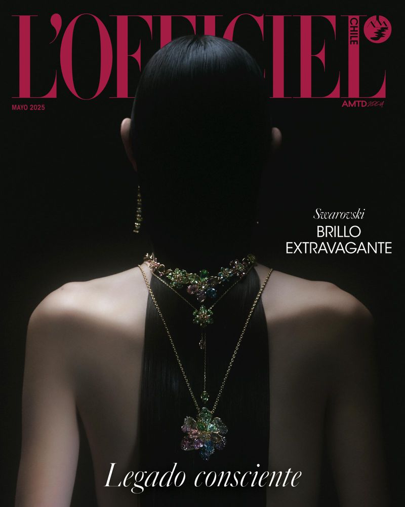 Magazine cover featuring a woman with black hair, wearing jewelry. The cover includes the 'L'Officiel' logo and various text elements.