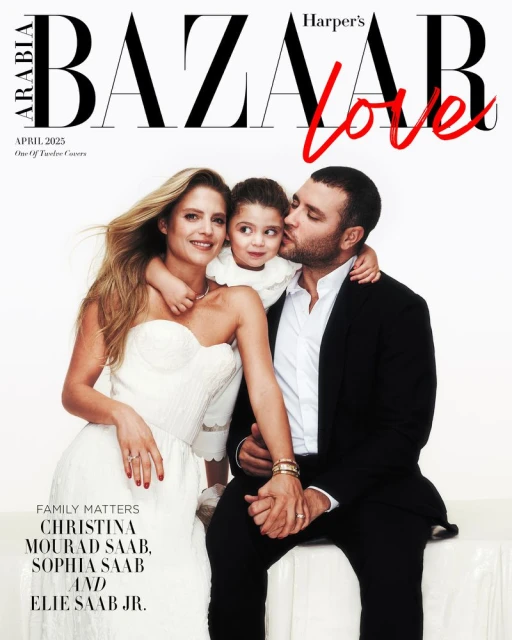 Harper's Bazaar Arabia cover featuring a family portrait of a woman in a white dress, a child, and a man in a black suit, smiling against a white backdrop.