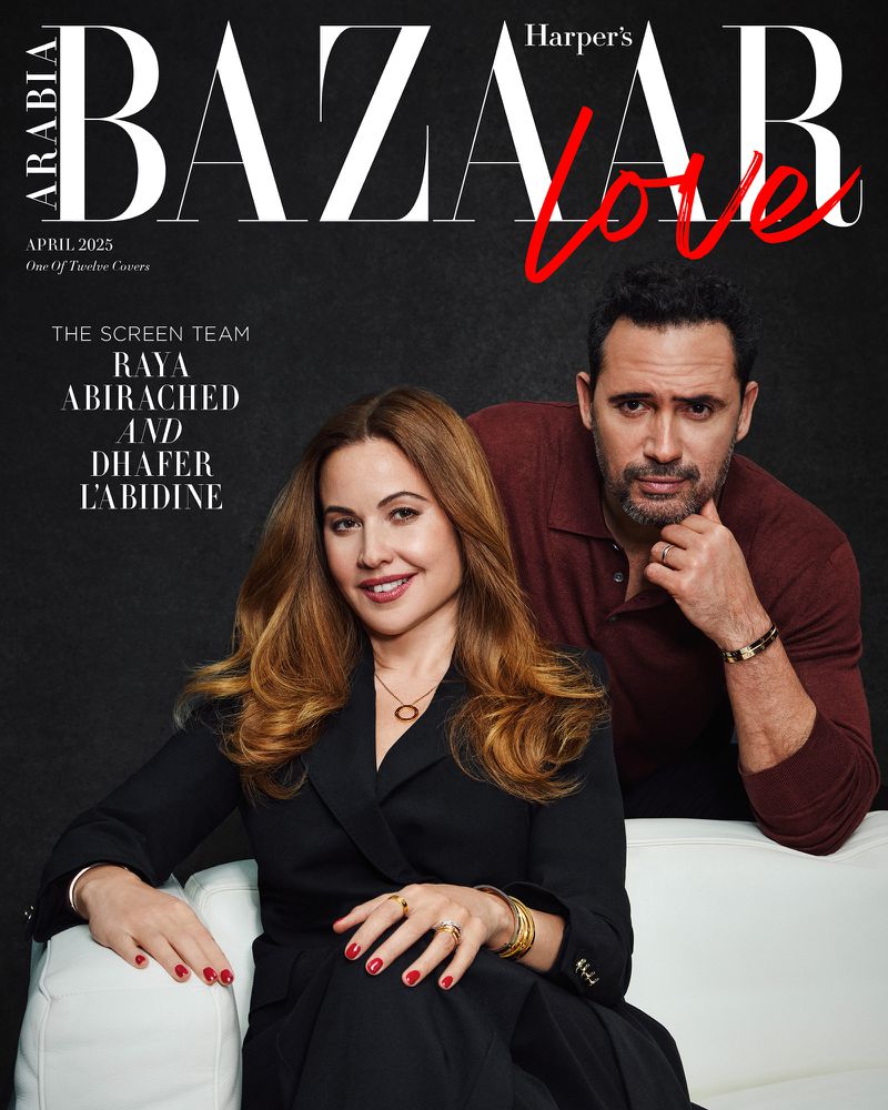 Magazine cover featuring Raya Abirached and Dhafer L'Abidine. Harper's Bazaar Arabia, April 2025 issue. Close-up studio shot, dark background.