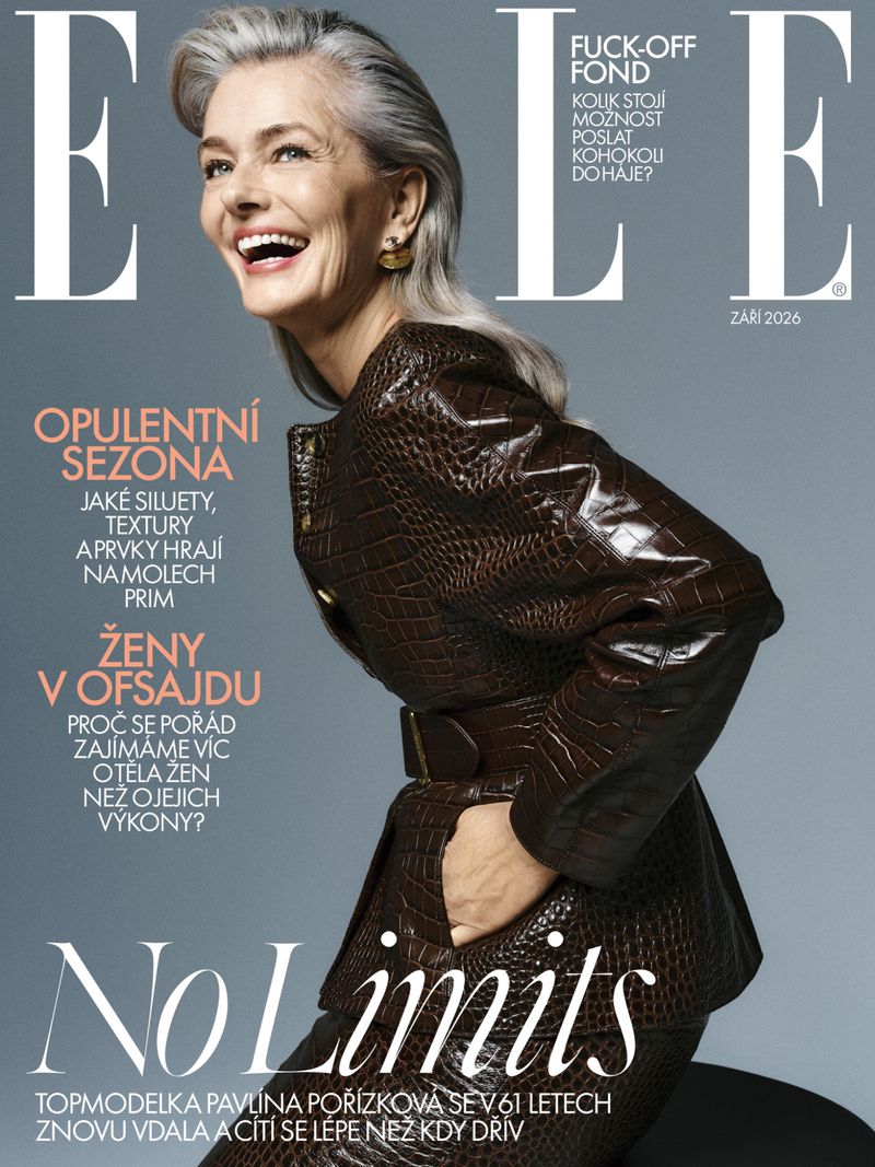 Pavlina Porizkova laughing on the cover of Elle Czech Republic, wearing a glossy dark brown crocodile-embossed leather jacket.