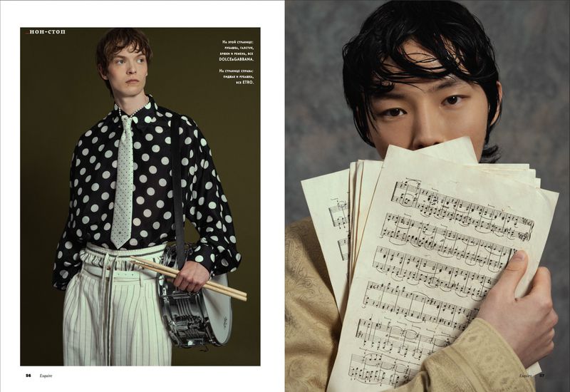 Two-page fashion spread featuring Dan Rogers holding a snare drum and Byeong Jik Oh holding sheet music in front of his face.
