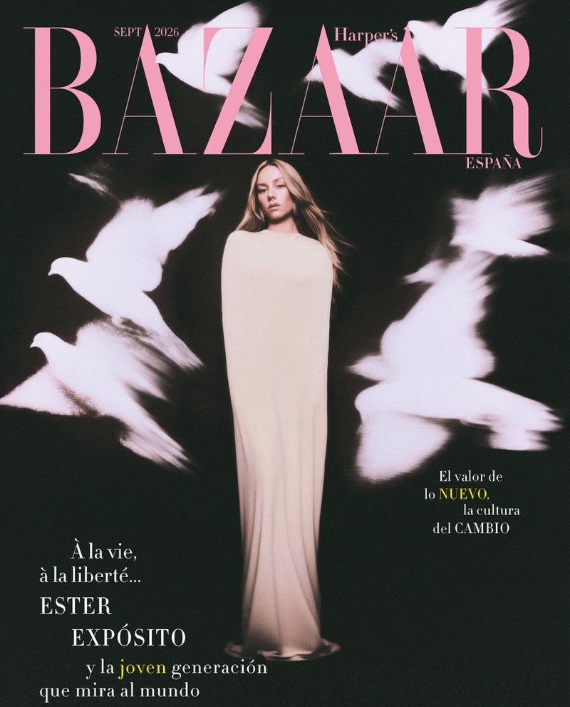 Ester Expósito on Harper's Bazaar España magazine cover wearing a long cream column dress surrounded by flying white dove silhouettes.
